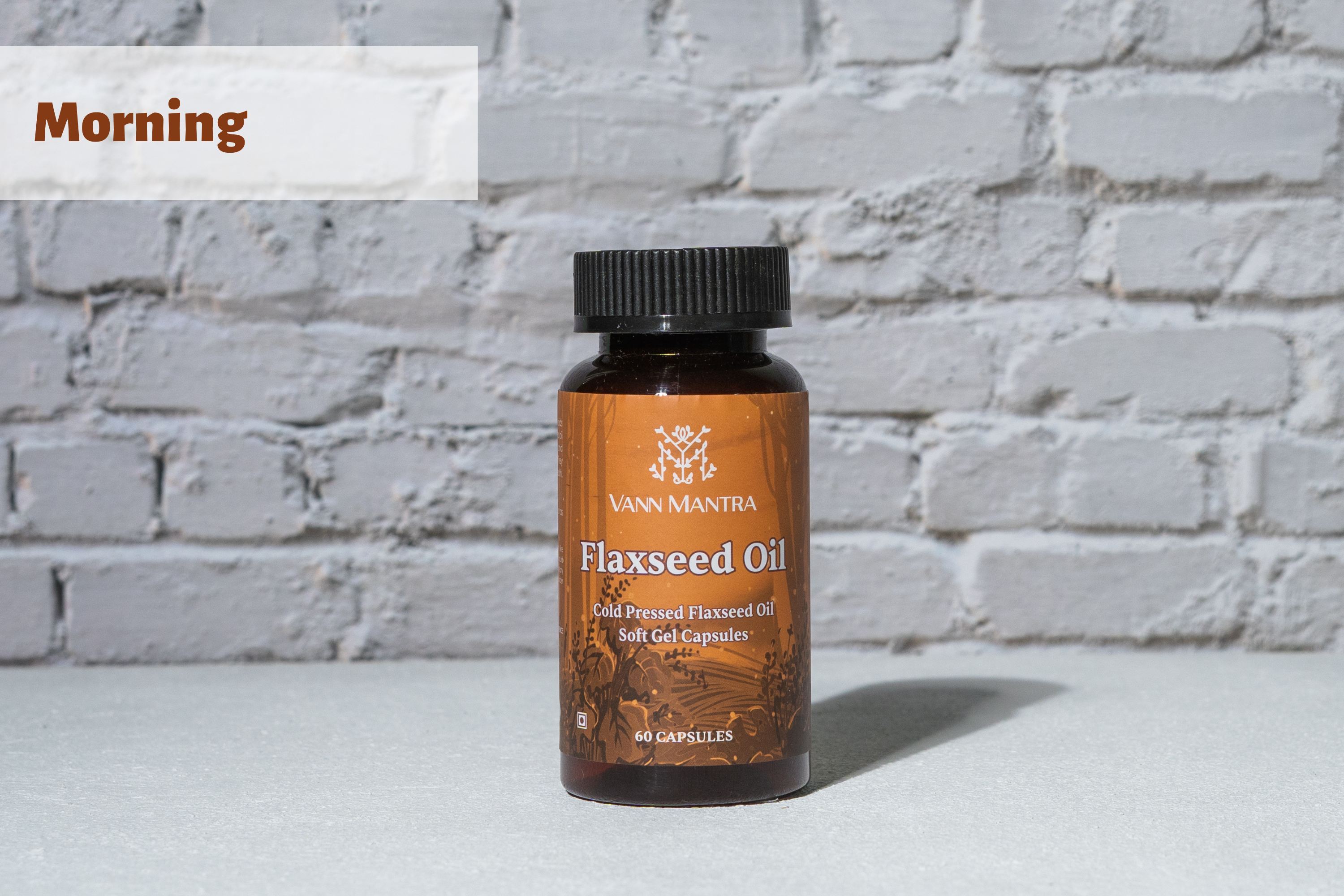 Flaxseed Oil Capsule in front of a brick wall 