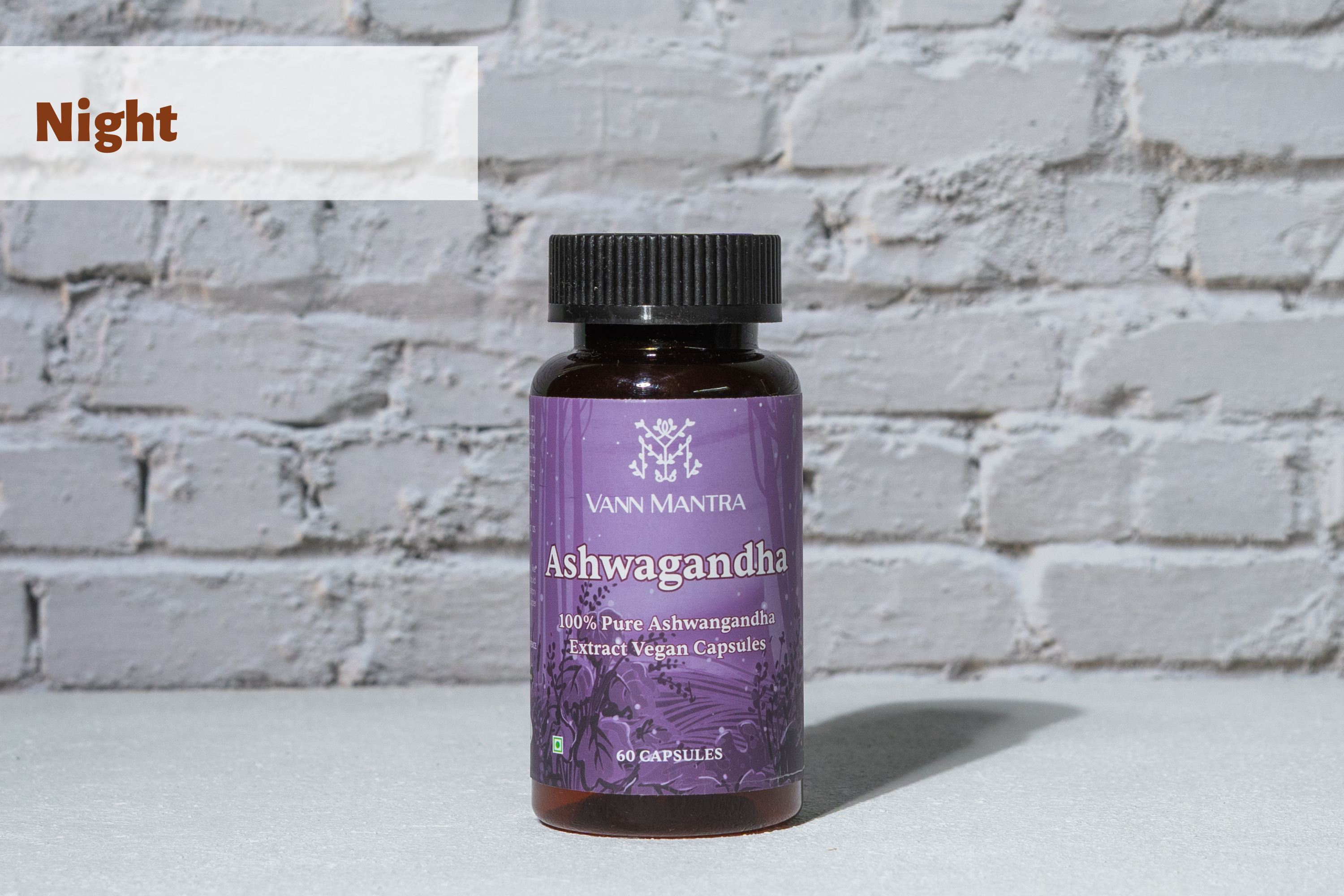 Ashwagandha Capsule in front of a brick wall 