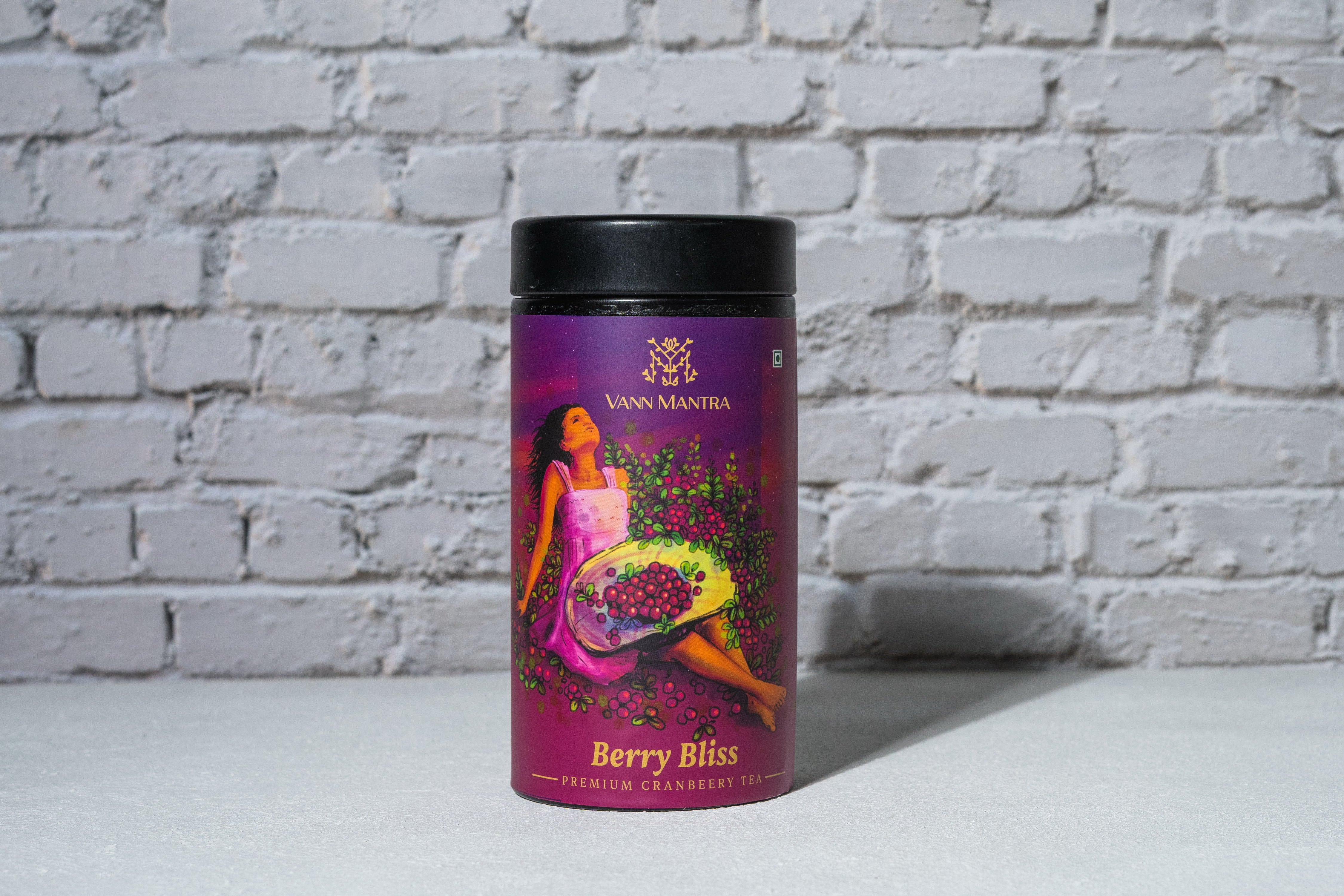 Berry Bliss Cranberry Tea in front of a brick wall 