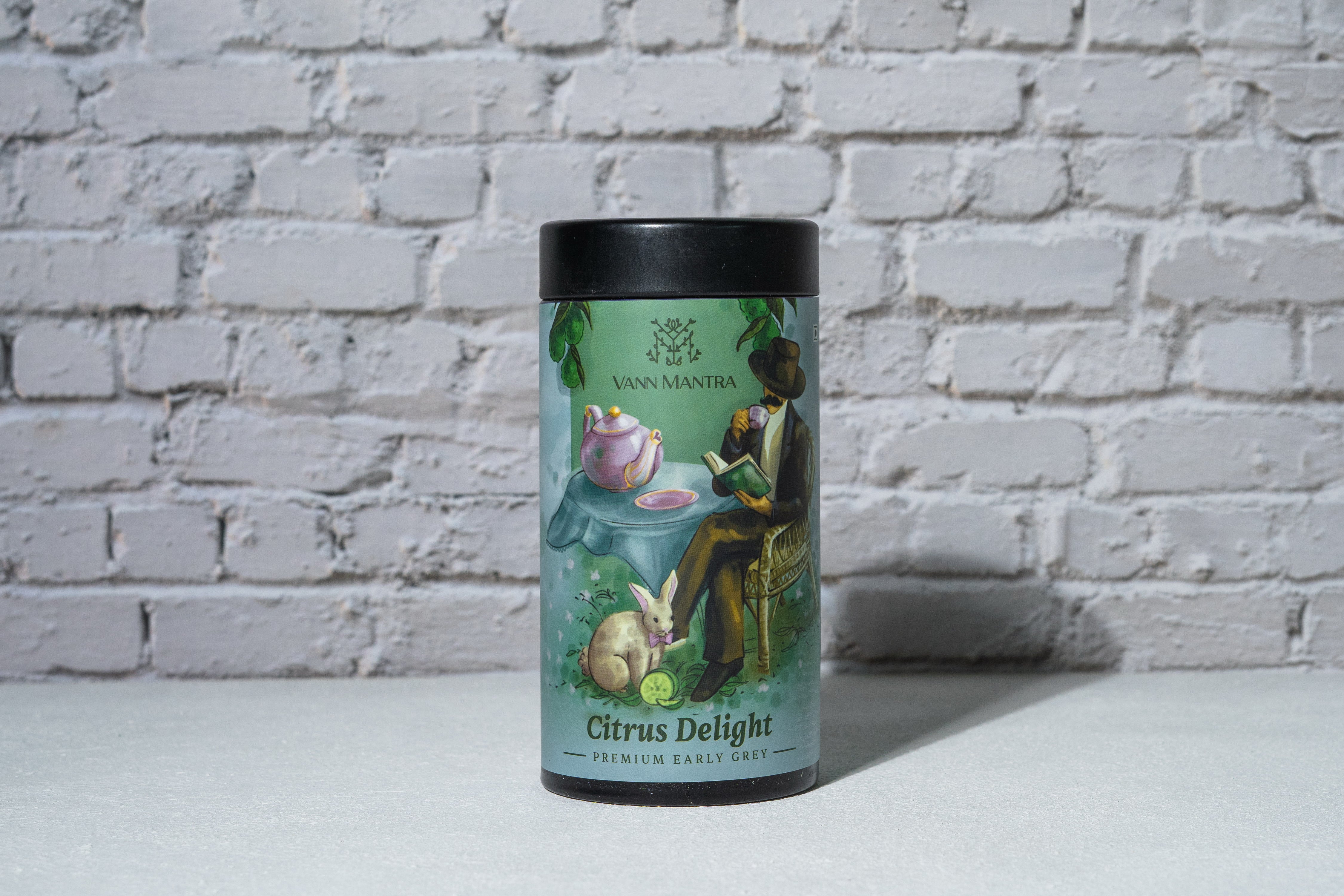 Citrus Delight- Premium Earl Grey Tea in front of a brick wall 