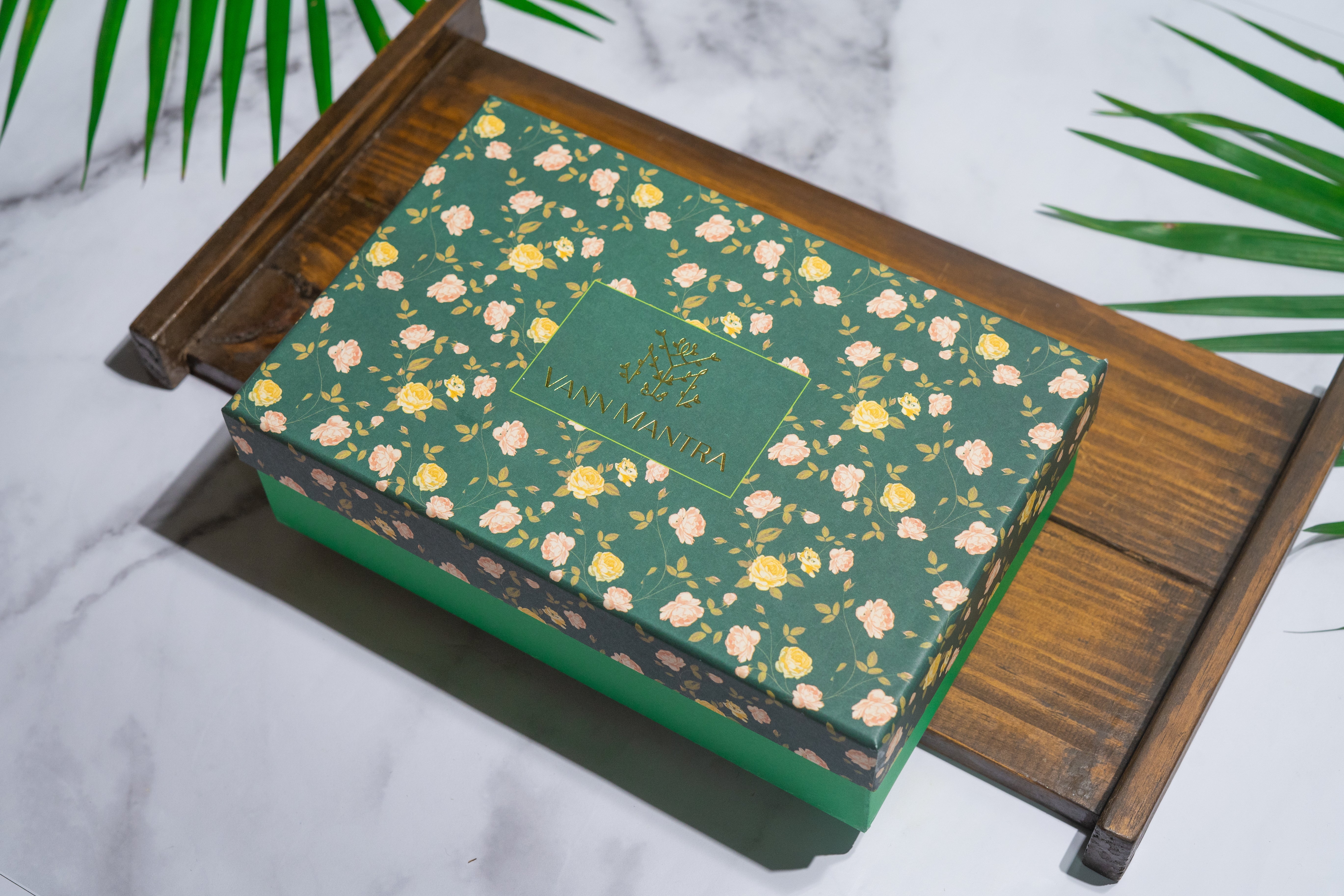 Box Of Morning - Afternoon - Night (Weight Warrior, Happy Belly, Calming Monk) on a wooden tray.
