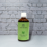 Hemp Seed OIl on a backdrop with plants. 