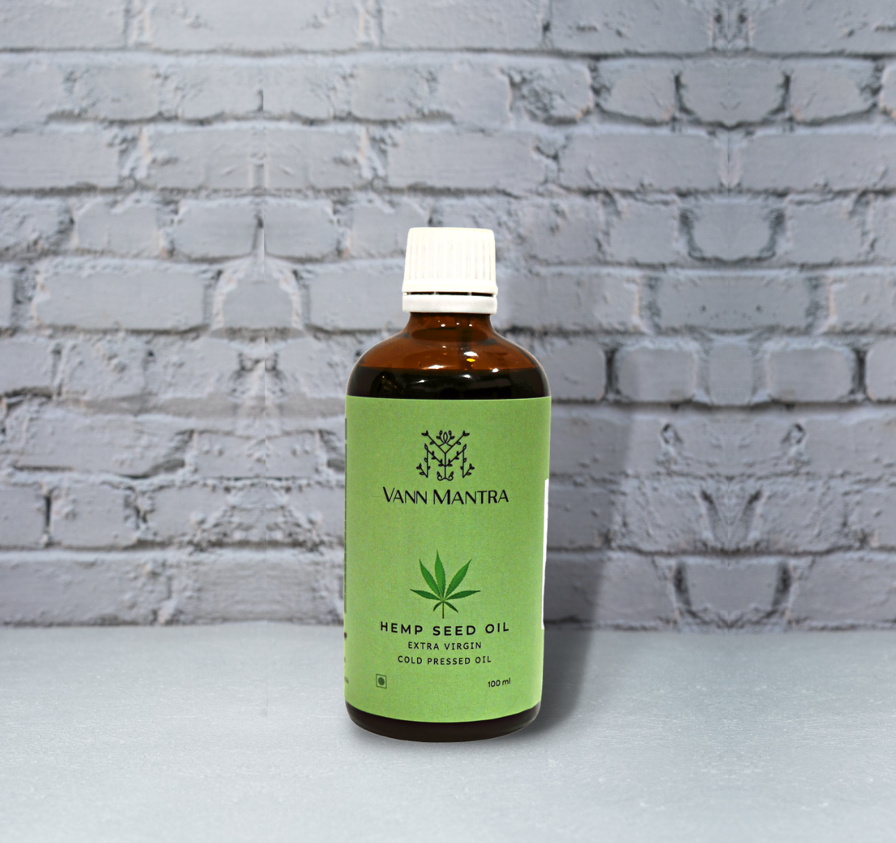 Hemp Seed OIl on a backdrop with plants. 
